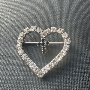 Elegant Silver Heart Brooch with Cross Accent